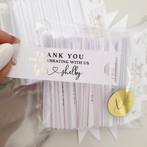 XOXOKristen gold foil Heart Connected Wedding Favor Tags featuring “Thank you for celebrating with us” and connected names with a heart symbol, printed on crisp white card — perfect for elegant wedding favors.