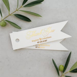 Petites étiquettes de remerciement pour cadeaux de mariage, dorées et personnalisées, motif cœur, rose, argent, calligraphie élégante.