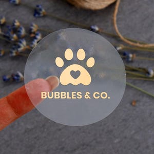Op maat gemaakte verijdelde duidelijke logo-labels stickers Gepersonaliseerde bedrijfslogo, rond logo-label, transparant goudfolielabel, logostickers aanpassen