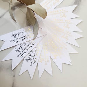 XOXOKristen gold foil Heart Connected Wedding Favor Tags featuring “Thank you for celebrating with us” and connected names with a heart symbol, printed on crisp white card — perfect for elegant wedding favors.