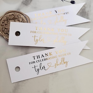 XOXOKristen gold foil Heart Connected Wedding Favor Tags featuring “Thank you for celebrating with us” and connected names with a heart symbol, printed on crisp white card — perfect for elegant wedding favors.