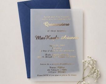 May include: A translucent vellum invitation card with gold foil lettering featuring the text Sarah and Troy Curran invite you to celebrate the Quinceanera of their daughter MarKayla Arianna on April 23, 2022, placed over a navy blue envelope.