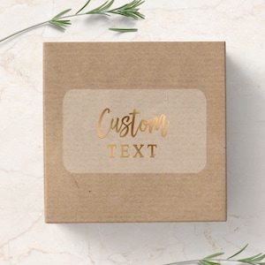 transparent rectangle labeling sticker with custom text in gold foiled print