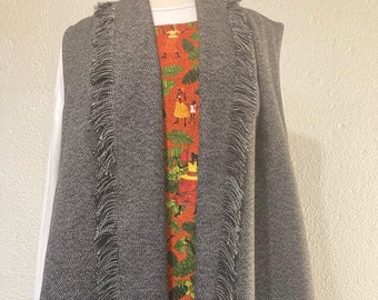 gilet, gilet long pour femme, gilet court pour femme, gilet en laine, gilet recyclé, gilet à franges, gilet en laine de mer