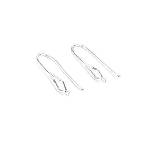 May include: Two silver earring hooks with a diamond-shaped opening at the top.