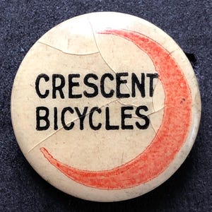 C. 1895 Crescent Bicycle Advertising Lapel Stud