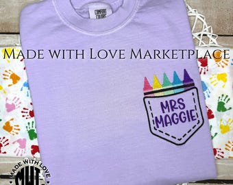 Personalized Crayon Pocket Teacher Embroidered Shirt, Back to School Comfort Colors Shirt or Gildan Crewneck Sweatshirt