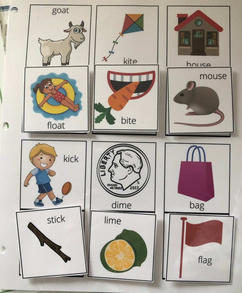 May include: A set of flashcards with pictures and words for learning basic vocabulary. The words include goat, kite, house, mouse, bite, float, kick, dime, lime, bag, stick, and flag.