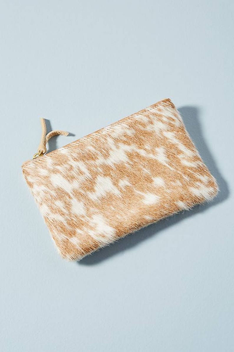 cowhide clutch bag