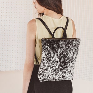 Moo Cow Print Shearling Backpack Black and White image 2