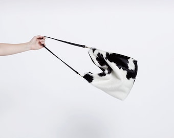 Bolso / Cartera / Bolso de mano tipo hobo de piel de vaca en blanco y negro