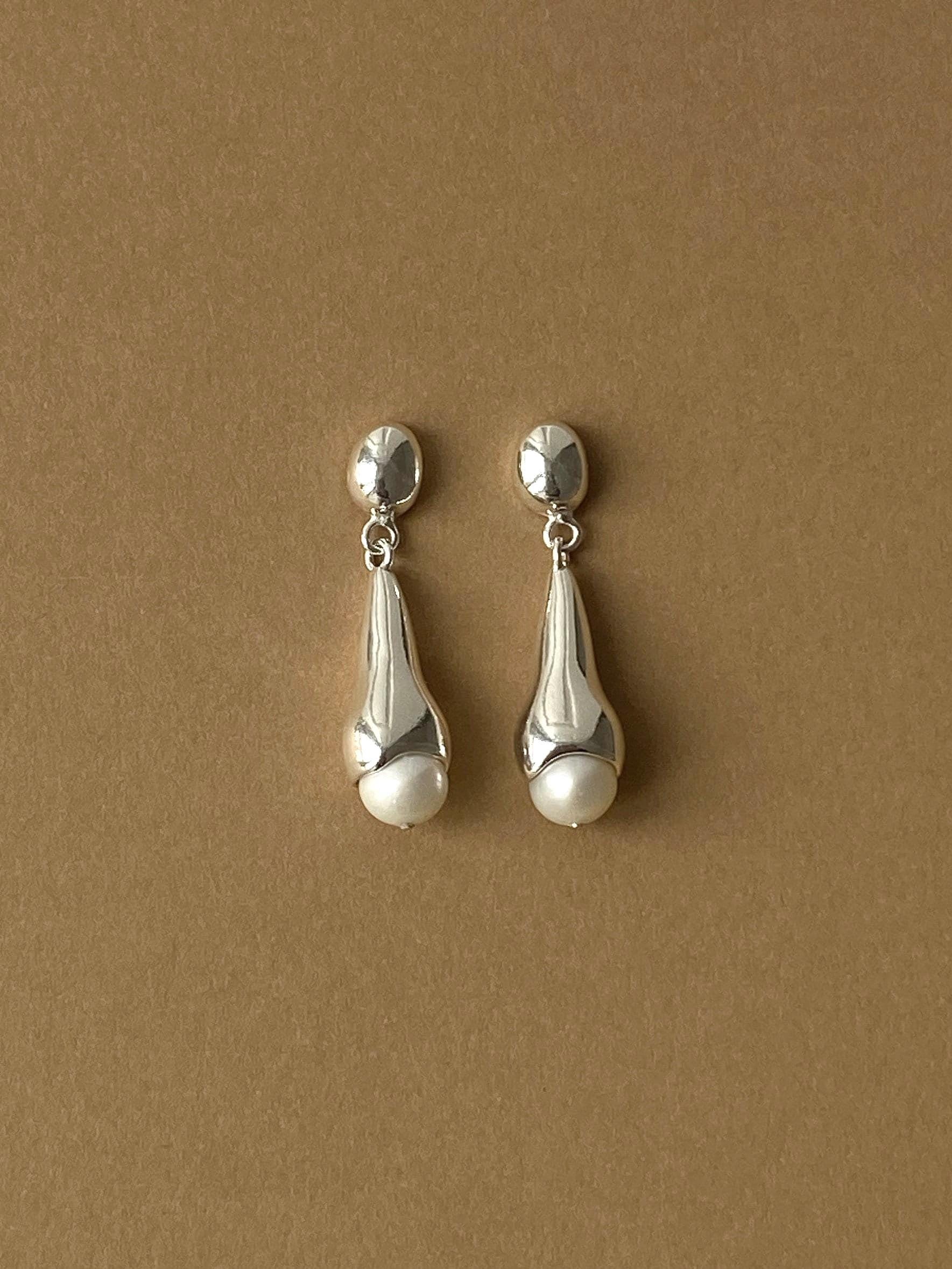 Brincos de pérolas Asawa