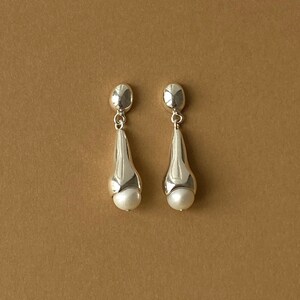 Brincos de pérolas Asawa