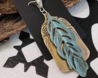 Green bronzed patina feather spoon pendant made from vintage silverware. Includes silver chain. Free shipping within Canada.