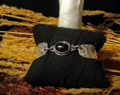 Black Onyx two piece spoon bracelet made of vintage silver plated Silverware.