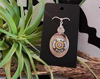 silverware pendant made from silver plated cutlery embellished with floral mandala. Includes silver chain. Free shipping within Canada.