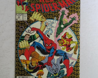 May include: A comic book cover for "Web of Spider-Man" issue #50. The cover features Spider-Man in a dynamic pose, surrounded by various villains and allies. The background is a gold pattern with the number 50. The Marvel logo is visible.