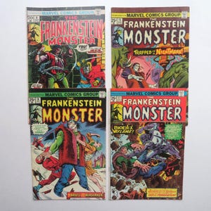 May include: Four vintage "Frankenstein Monster" comic books from Marvel Comics Group. The covers feature colorful illustrations of the monster and other characters, with text including issue numbers and titles like "Trapped in Nightmare!"