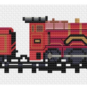 Puede incluir: Un tren de vapor rojo y dorado con un solo vagón de pasajeros. El tren está en una vía negra.