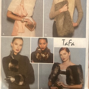 May include: Vogue Accessories sewing pattern V9234, featuring four different styles of fur collars and stoles. The pattern includes instructions for making a white fur stole with a pink satin bow, a brown and white striped fur stole, a leopard print fur collar, and a brown fur stole with a shawl collar.