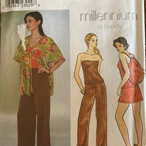 May include: Simplicity sewing pattern number 8732, millennium collection, for sizes 16, 18, and 20. The pattern includes three different styles: a top with a wrap, a strapless top with pants, and a tank top with shorts. The pattern is printed on a white background with a brown and green color scheme.