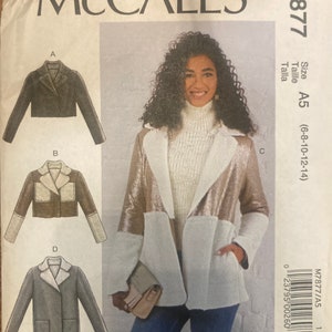 May include: Sewing pattern for a jacket with a faux fur collar and a sparkly fabric panel. The pattern includes four different styles of jackets, labeled A, B, C, and D. The pattern is for sizes 6-8-10-12-14.