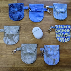 Google Pixel Buds Case Keychain. Series A Pixel Buds Case. Blue Pixel Buds Case with Keychain. Colorful Buds Case. Grey Pixel Buds Case.