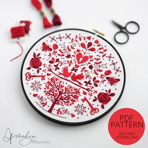 May include: Red and white embroidery hoop featuring a design of a tree with hearts, birds, keys, and snowflakes. The text "PDF PATTERN INSTANT DOWNLOAD" is below the hoop.
