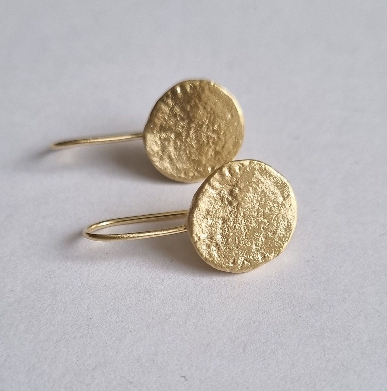 Gold disc earrings