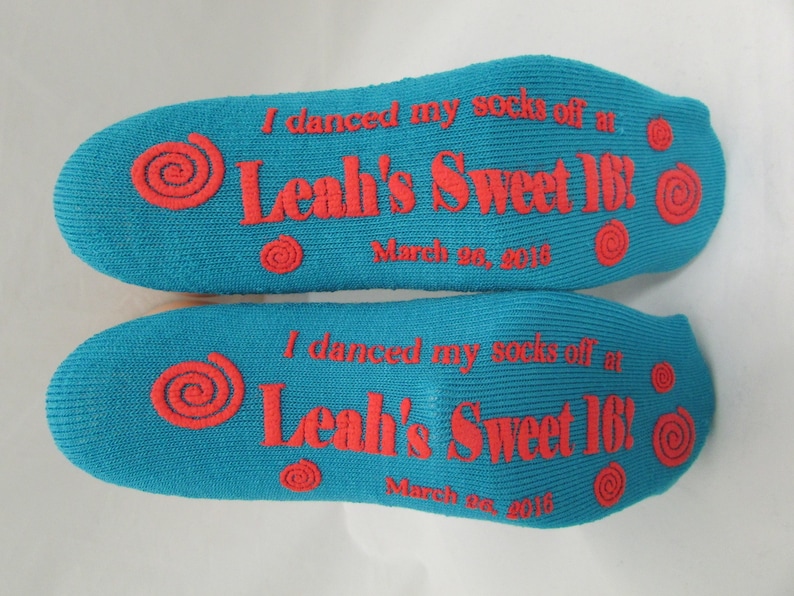 Puede incluir: Un par de calcetines azules con texto rojo que dice "I danced my socks off at Leah's Sweet 16! March 24, 2016".