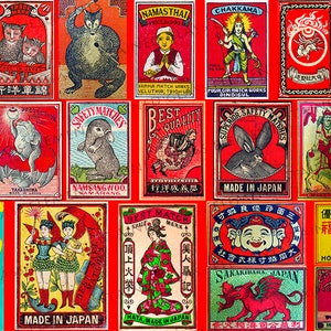May include: A collage of vintage matchbox labels featuring a variety of designs and text. The labels depict animals, people, and geometric patterns, primarily in red with black, white, and gold accents. The text on the labels includes "Happy Brand", "Safety Matches", "Best Quality", "Made in Japan", and "Hokurikumatch Co. Ltd."