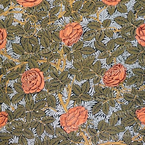 May include: A repeating pattern of stylised roses and leaves in shades of green, orange, and white on a black background.