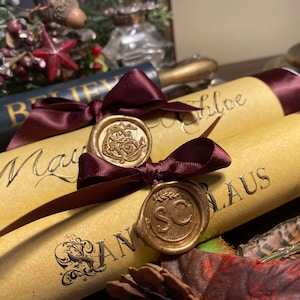 Antique scroll from Father Christmas scented Gold embossed parchment calligraphy rolled letter in a keepsake scroll holder