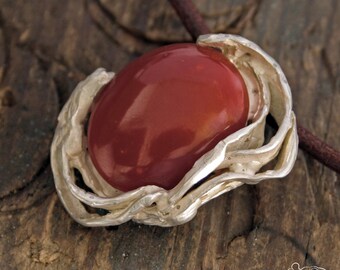 Silver pendant with coral