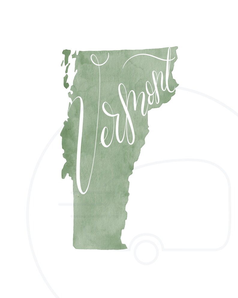 May include: A watercolor-style print of the state of Vermont in a muted green hue. The word "Vermont" is written in elegant white script across the state's outline. The background is white.