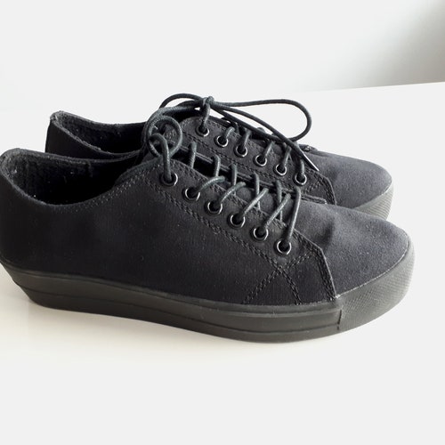 plain black plimsolls