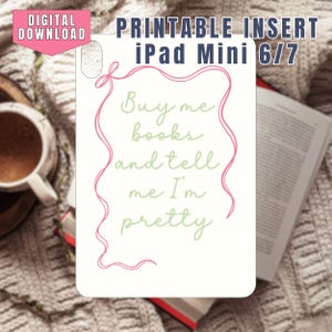 May include: A white printable insert for iPad Mini 6/7 with the text "Buy me books and tell me I'm pretty" in green script, framed by a pink line. The words "DIGITAL DOWNLOAD" are in a pink banner.