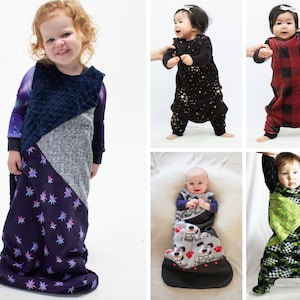 May include: Five different baby sleep sacks in various colors and patterns. The sleep sacks are made of soft, comfortable fabric and feature a variety of designs, including stars, plaid, and a dog print.
