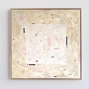 May include: Abstract painting with a light beige background and a central white square. The artwork features small, colorful shapes and lines in pink, black, yellow, and red, framed in a light wood frame.