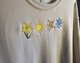 Four Seasons Embroidered Cream Sweatshirt | Seasonal Icons Jumper | Winter Spring Summer Fall Pullover | Stylish Embroidered Sweater