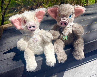 Set of two plush piglet dolls
