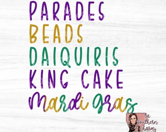 May include: Purple, gold, and green text on a white wood background reads "Parades Beads Daiquiris King Cake Mardi Gras".