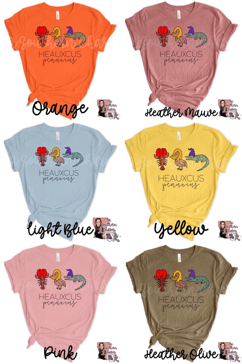 May include: Six different colored t-shirts with a graphic of a crawfish, pelican, and alligator with the text "HEAUXCUS peauxcus". The t-shirt colors are orange, heather mauve, light blue, yellow, pink, and heather olive.
