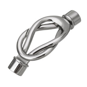 May include: A silver metal curtain rod finial with a knot design.
