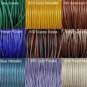 May include: A collection of 9 different colors of leather cord, each color is labeled with a number and a name. The colors are: Sea Green, Gold Metallic, American Walnut, Vintage Purple, Gypsy Sippa, Dark Brown, Blue Metallic, Light Purple, and Pearl Metallic.