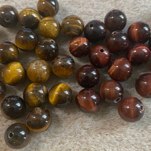 Lot mit 12 Tigeraugenperlen 8 mm