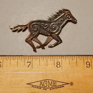 Horse brooch with Celtic spirals in bronze by Master Ark