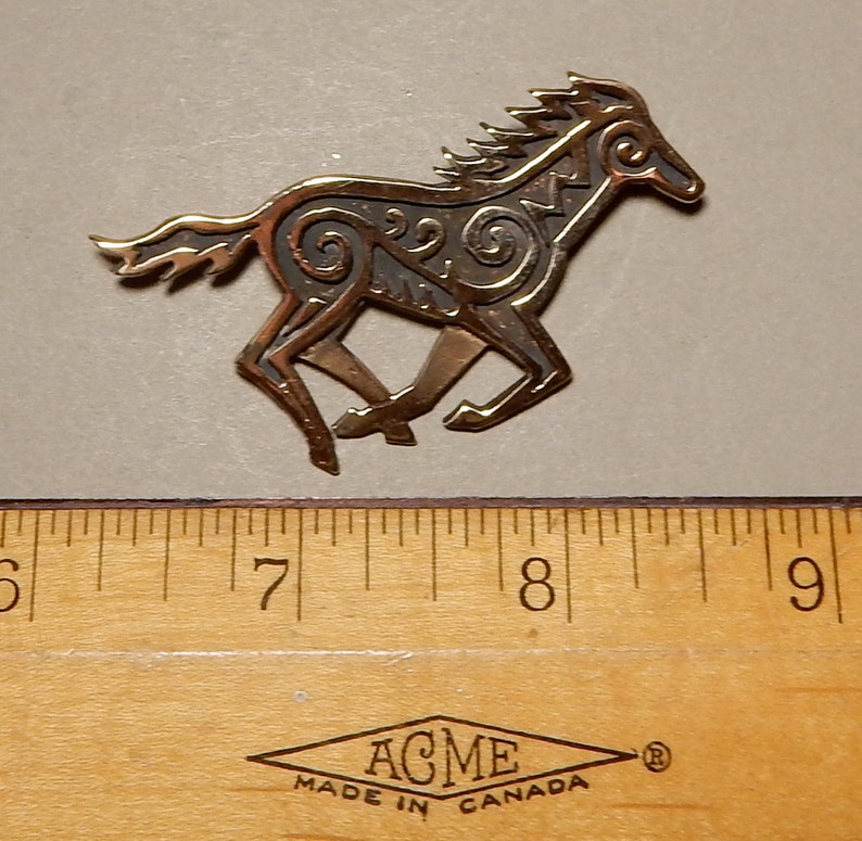 Horse brooch with Celtic spirals in bronze by Master Ark