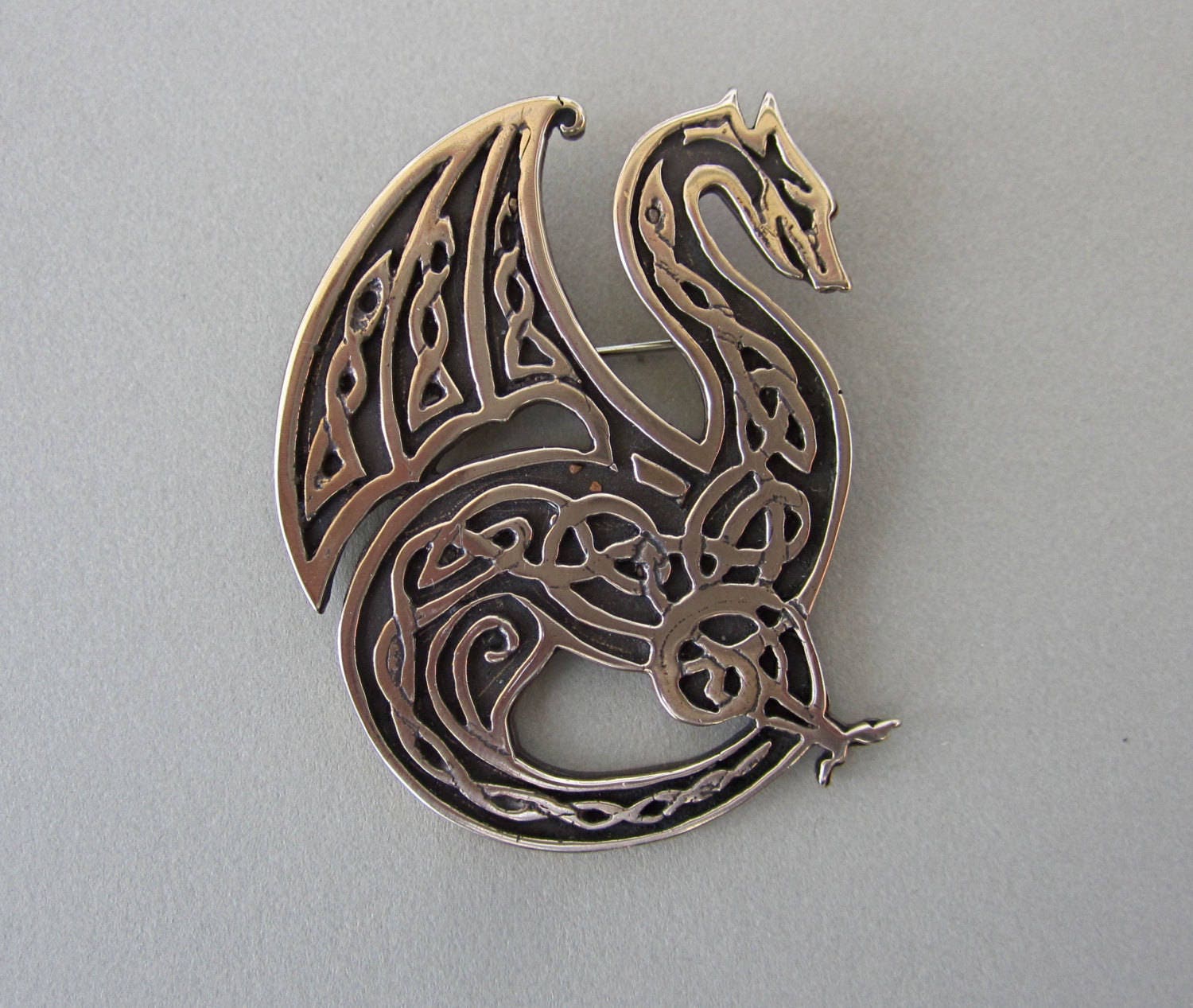 Dragon brooch deals