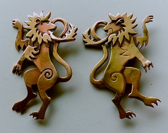 Pair of Lion Brooches in Bronze